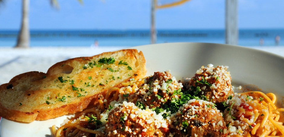 meatballs and garlic bread on the beach at Salute