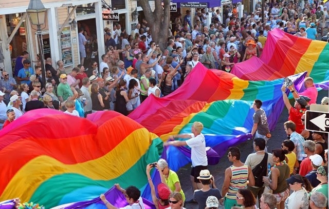 People waving a pride flag.