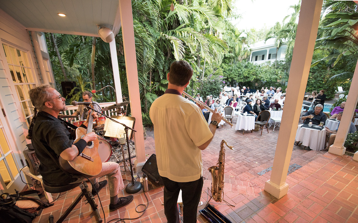 Musicians playing to an audience.