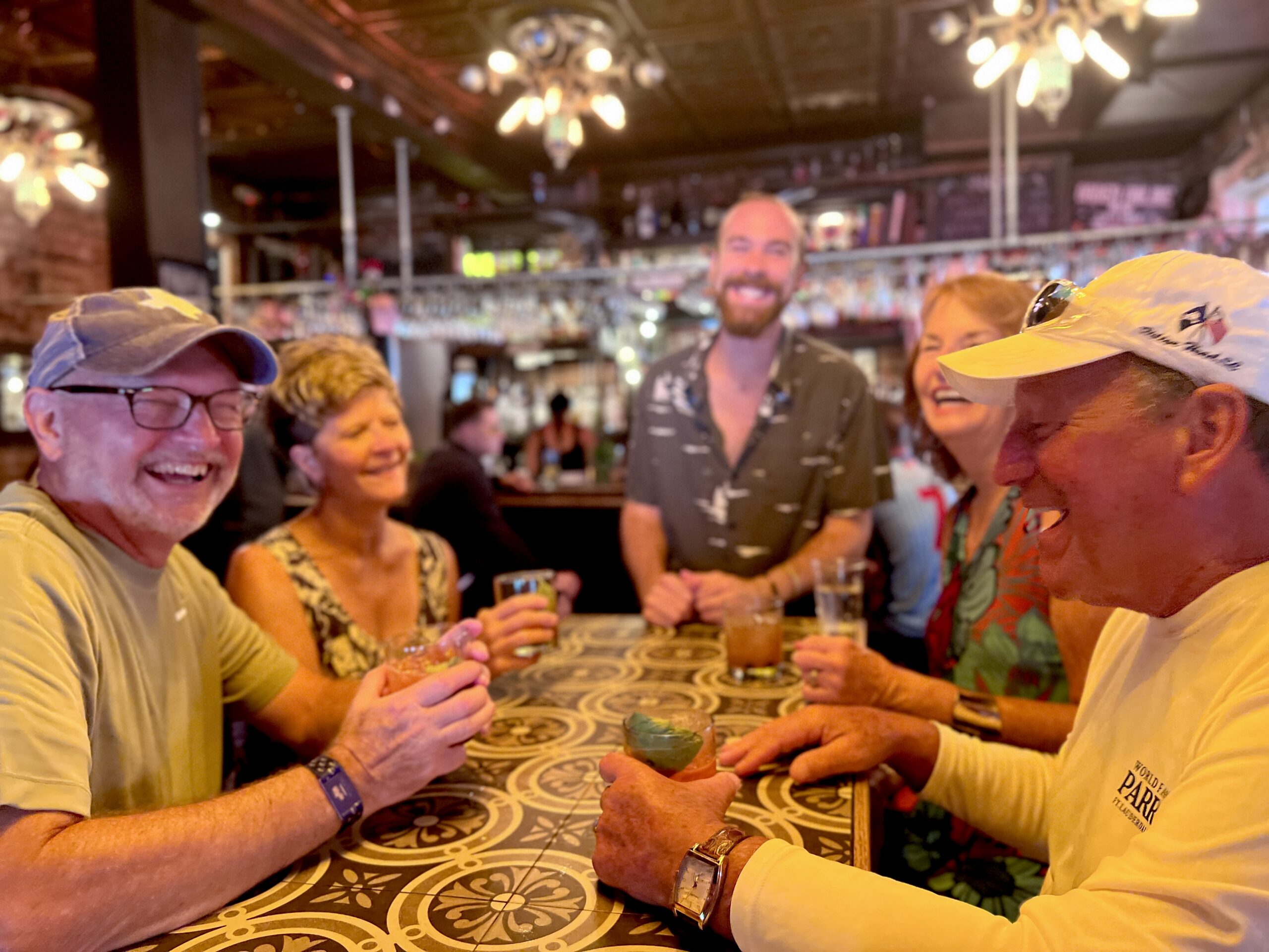 a group of people sitting at a table